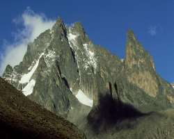 Mount Kenya has the three highest peaks as Nelion, Batian, and Leana. All three peaks are covered with around 11 small glaciers Mount Kenya has the three highest peaks as Nelion, Batian, and Leana. All three peaks are covered with around 11 small glaciers.